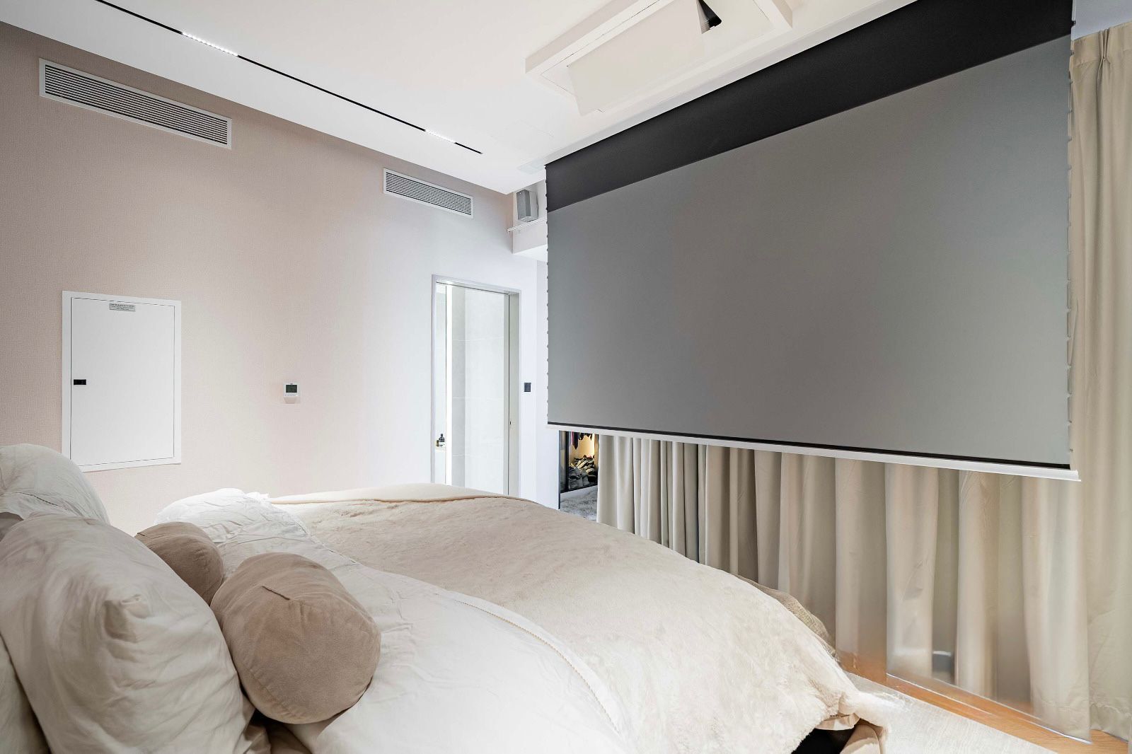 Top-floor cinema room with projector screen