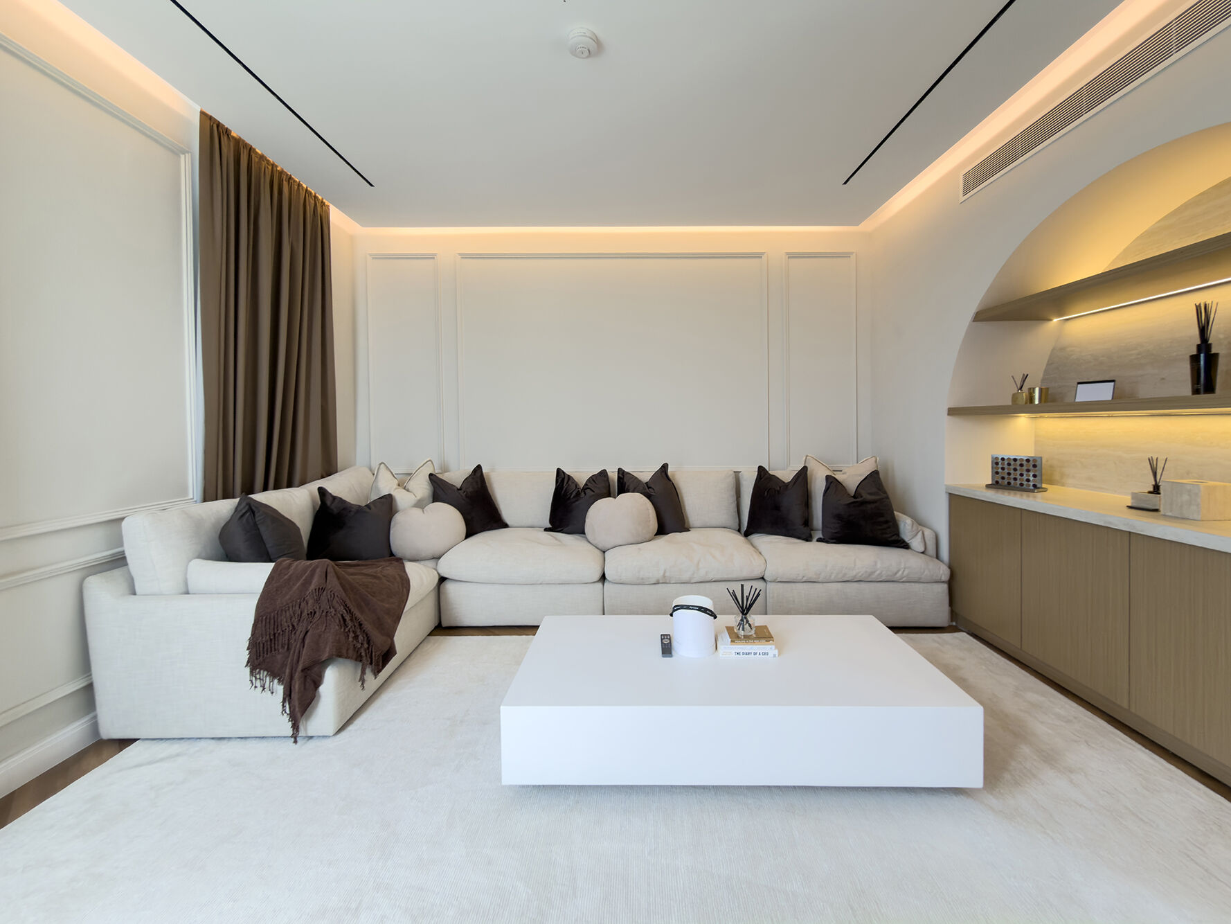 Upstairs entertainment lounge with arched alcove